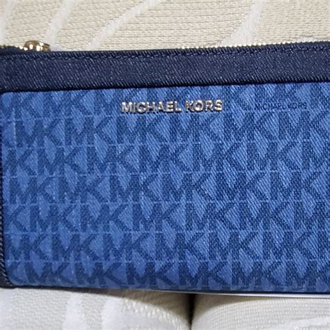 price for michael kors wallet|Michael Kors denim wallet.